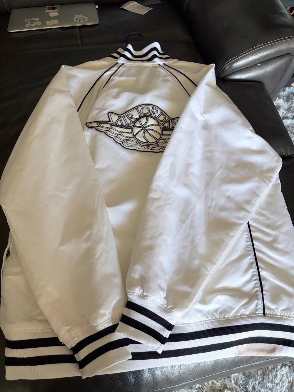Jordan White Jacket with Black Collar Stripe and Red Jumpman Tag
